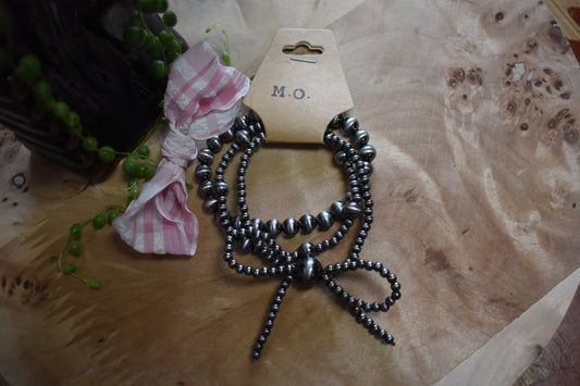 NP Bow Bracelet Stack